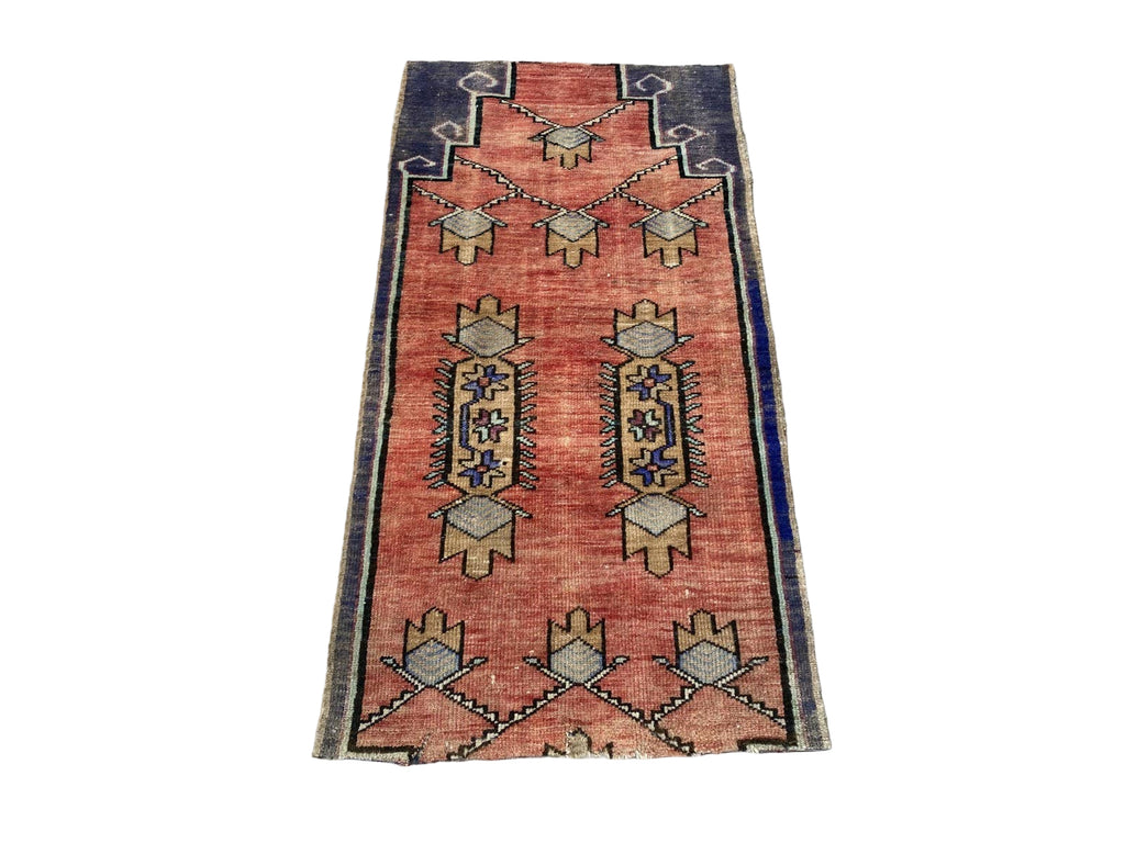 red and blue patterned rug 