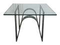 Modern chrome and glass arched-base side table