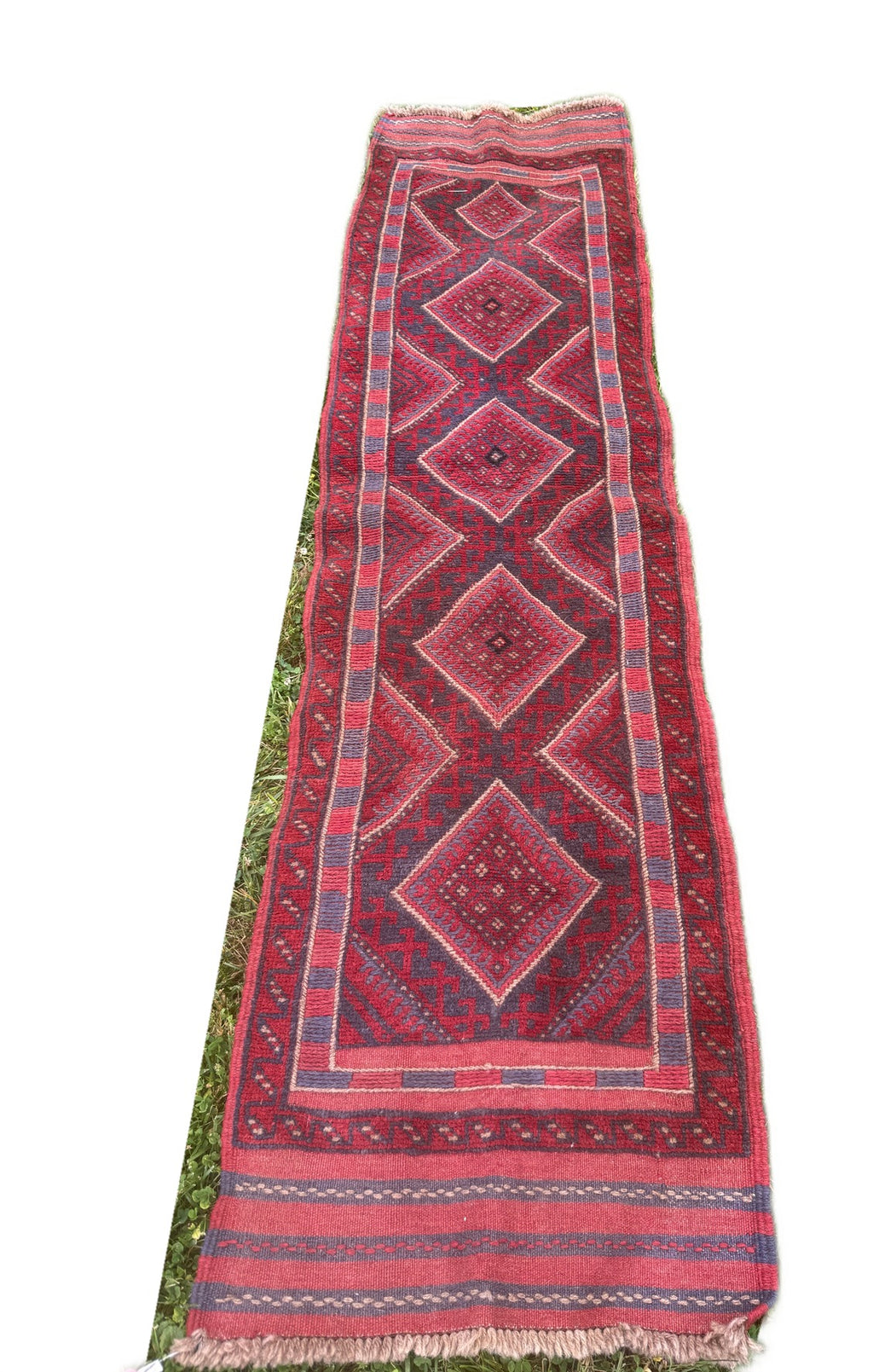 hand knotted runner diamond on white background